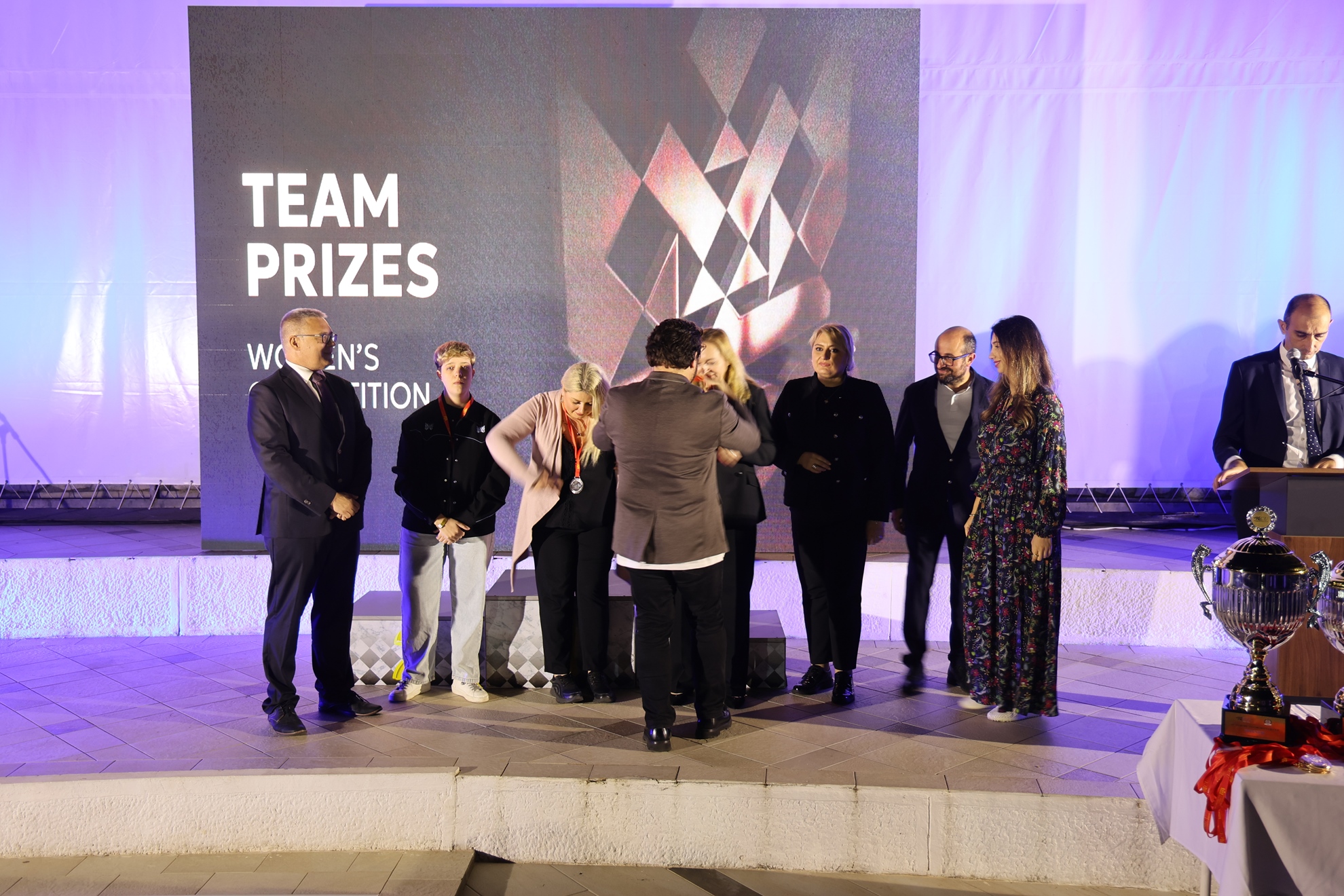Gambit Bonnevoie receives its European team silver medals.