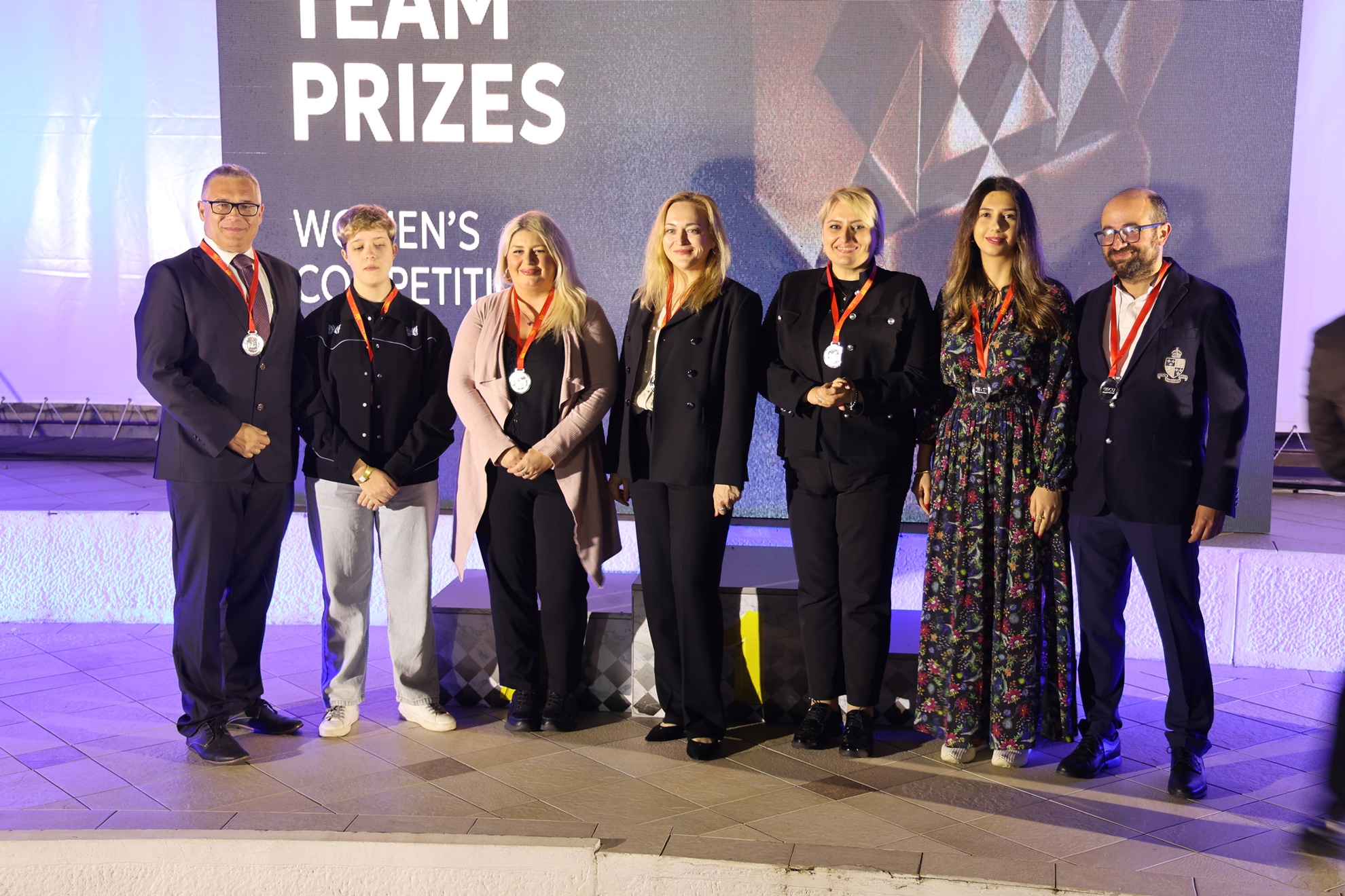 Our women’s team with club president Jan Bednarich and coach and captain Petar Arnaudov.