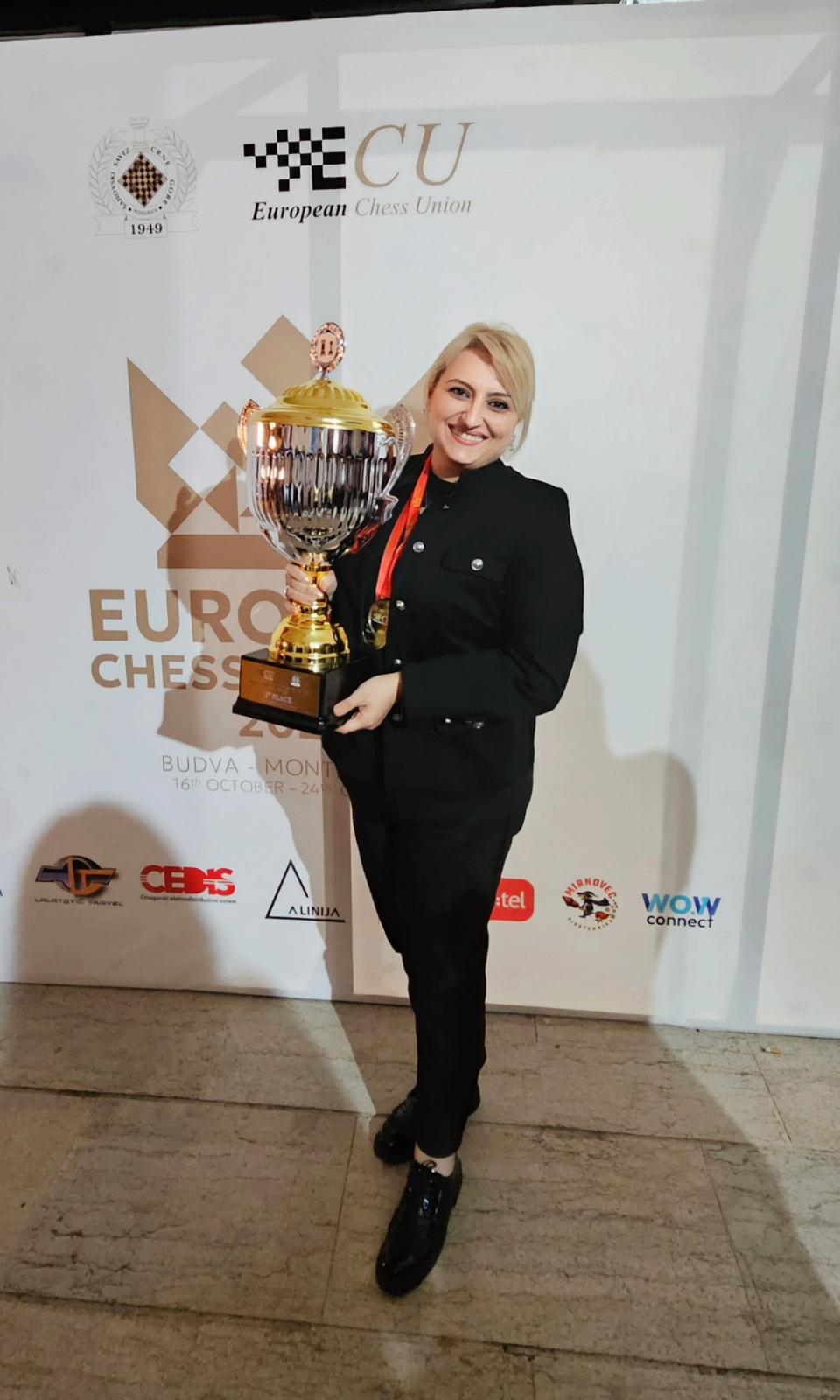 A Gambit Bonnevoie player celebrating with the European team silver trophy.